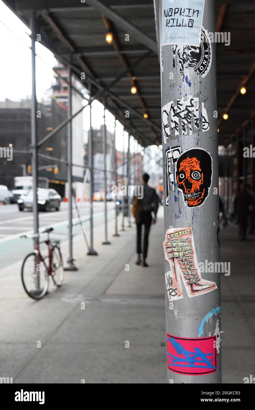 New York City sidewalk, covered in scaffolding and graffiti Stock Photo