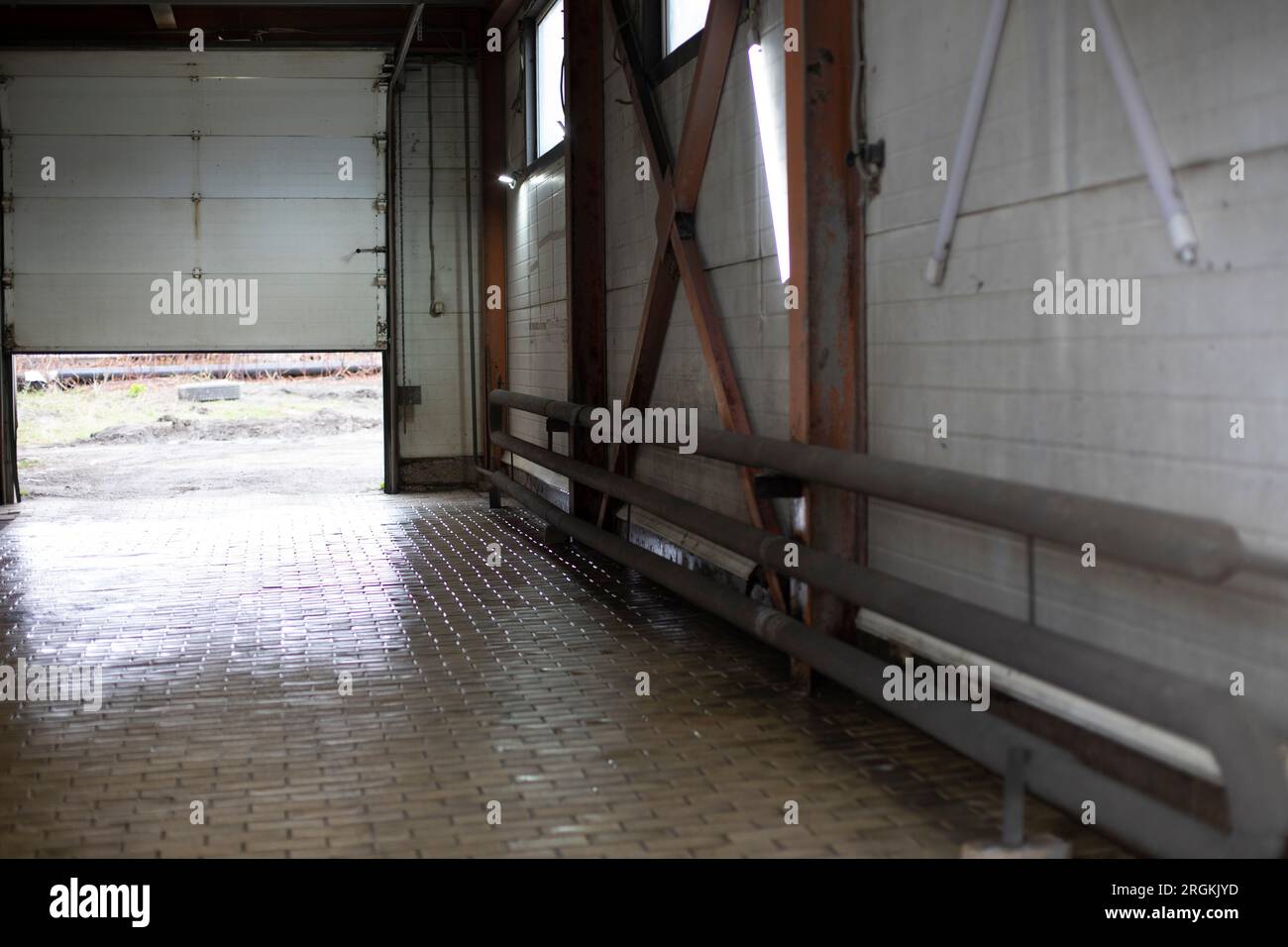 Items in garage. Workplace for creating structure. Production shop. Working tools on table. Stock Photo