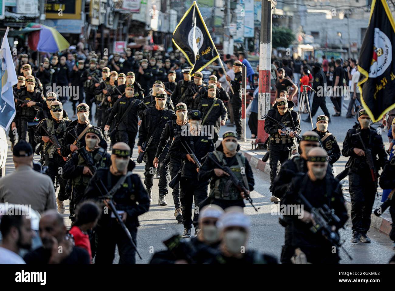 August 9, 2023: Rafah, Gaza Strip, Palestine. 9 August 2023. Members of the Al-Quds Brigades, the military wing of Palestinian Islamic Jihad, hold a military parade in the southern Gaza Strip city of Rafah. The event was held to commemorate Palestinian Islamic Jihad members targeted by Israel over the last year, as well as the PIJ fighters killed in Israel's military operation in the Gaza Strip in May 2023 (Credit Image: © Yousef Mohammed/IMAGESLIVE via ZUMA Press Wire) EDITORIAL USAGE ONLY! Not for Commercial USAGE! Stock Photo