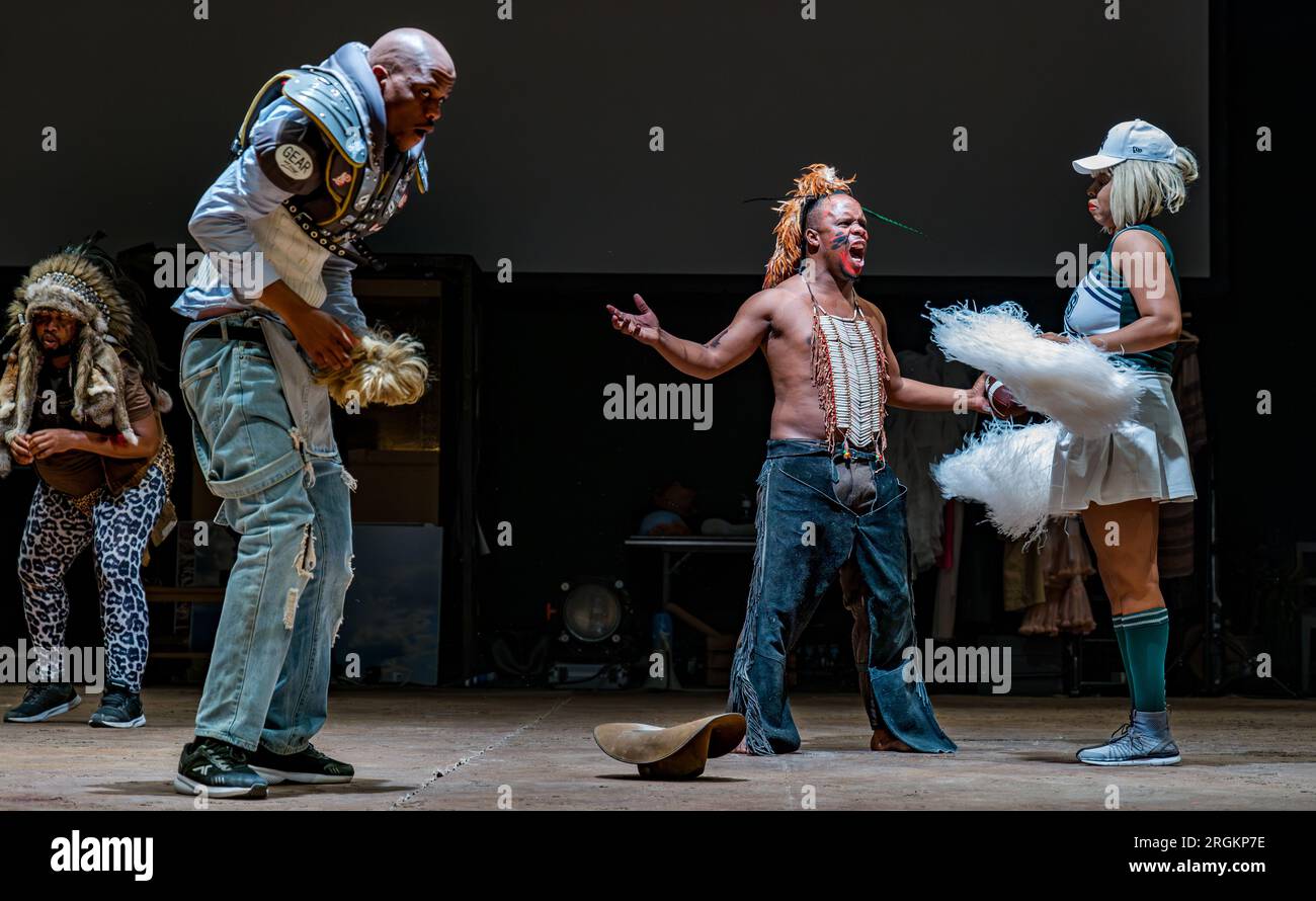 Edinburgh, Scotland, UK, 10 August 2023. Dark Noon at Edinburgh Festival Fringe: Dark Noon is a playful piece of theatre which tells the story of the Wild West. Actors portraying Cowboys and Native Americans perform in this American football scene from the show. Credit: Sally Anderson/Alamy Live News Stock Photo