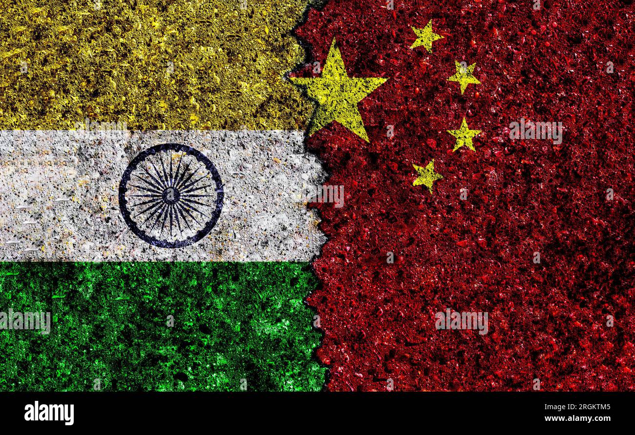China and India painted flags on wall with grunge texture. China and India conflict. China vs India Stock Photo