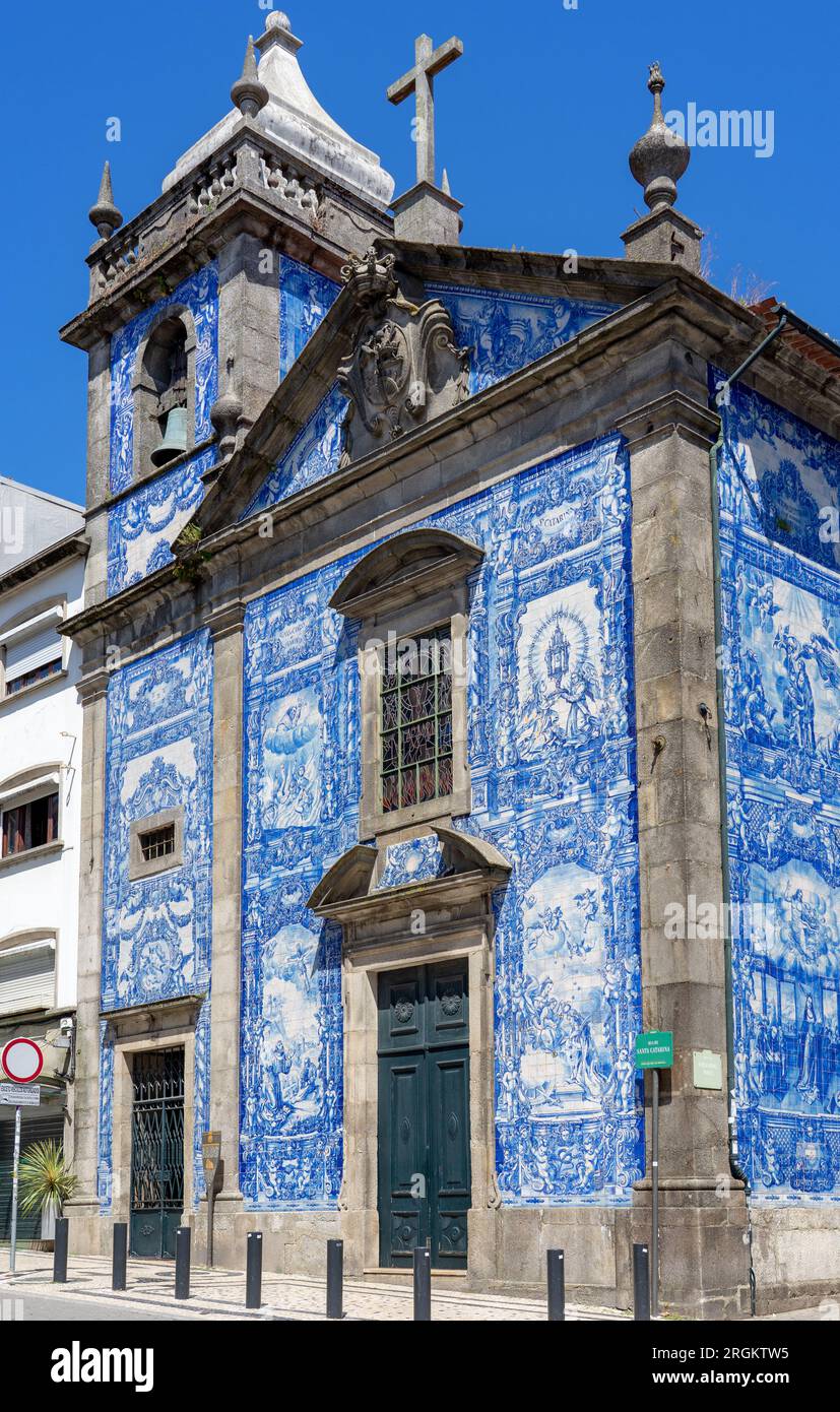chapel of souls capela das almas with beautiful blue white azulejo tiles facade in Porto Portugal . Stock Photo