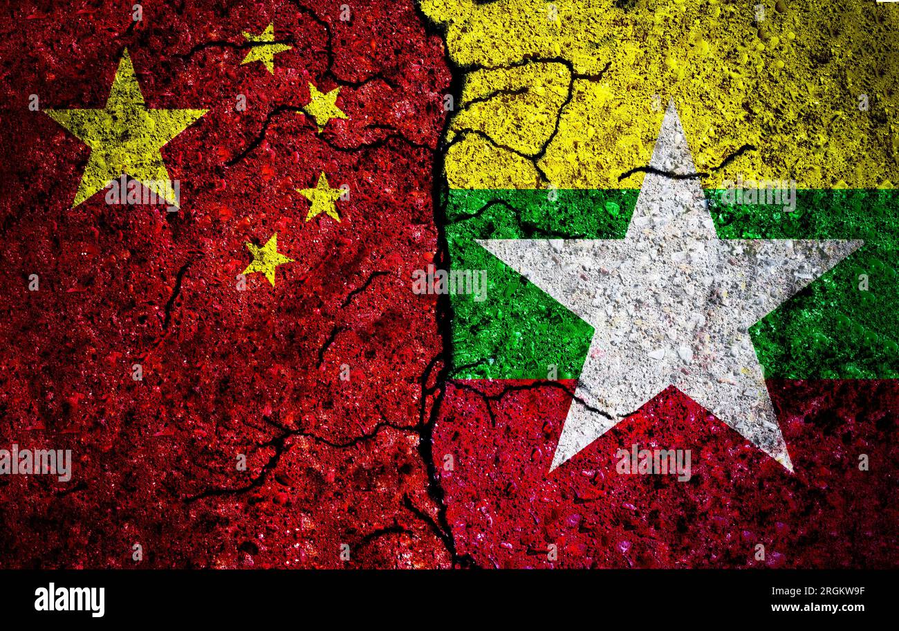 China and Myanmar painted flags on wall with grunge texture. China and Myanmar conflict. China vs Myanmar Stock Photo