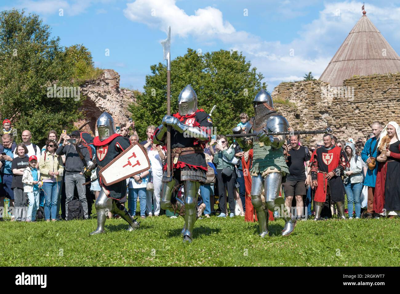 SHLISSELBURG, RUSSIA - JULY 29, 2023: Medieval knights go out to fight. Historical festival 'Epic Island-2023'. Oreshek fortress Stock Photo