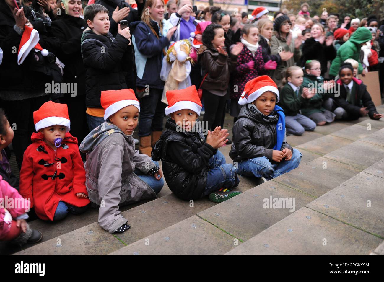 Children wearing Santa hats for the switching on of the Christmas ...