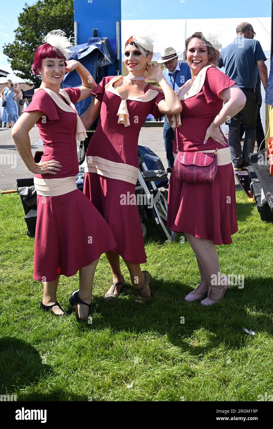 Brighton UK 10th August 2023 - Happy entertainers enjoy a beautiful sunny day at Brighton Races Ladies Day  during the Star Sports 3 day Festival of Racing    : Credit Simon Dack / Alamy Live News Stock Photo