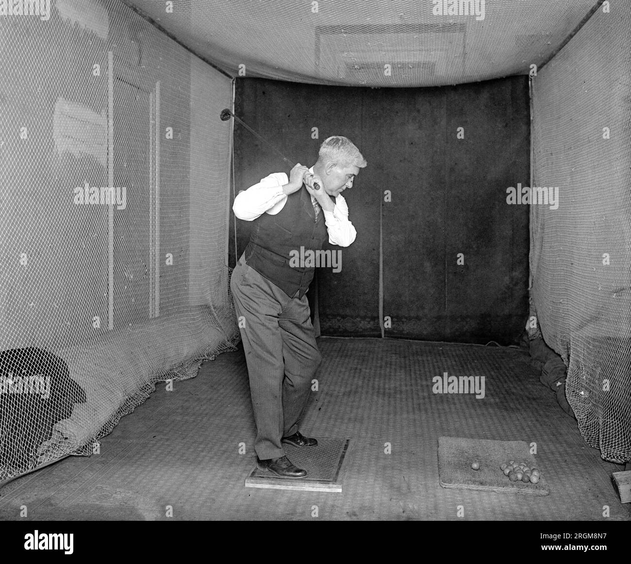 Rep. Vestal on indoor golf course in the House gym ca. 1926 Stock Photo