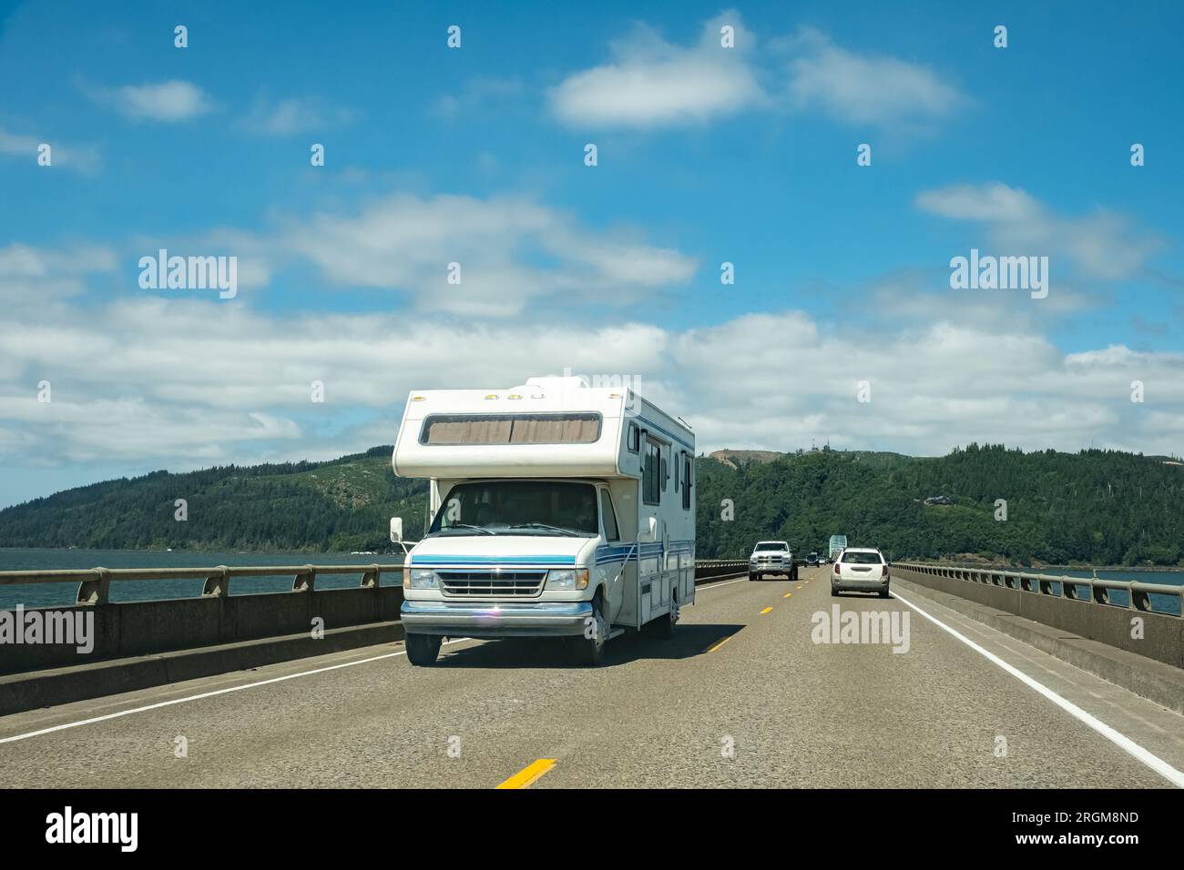 Motorhome camper van RV road trip. People on travel vacation adventure