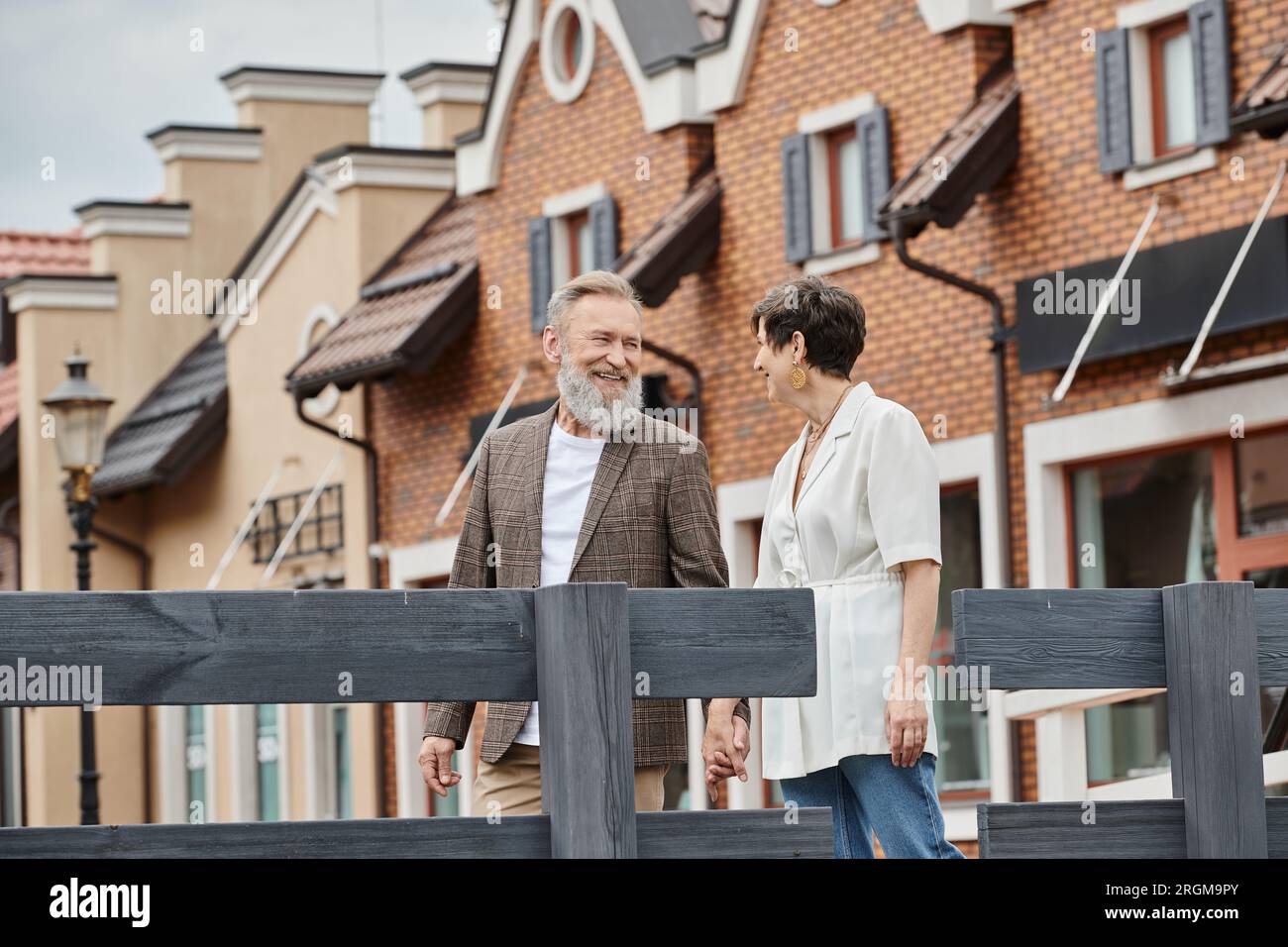 positive elderly couple, senior man and woman during date, husband and