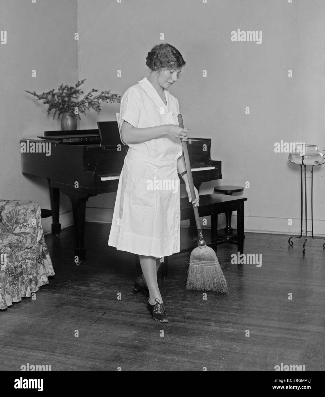 Black woman sweeping hires stock photography and images Alamy