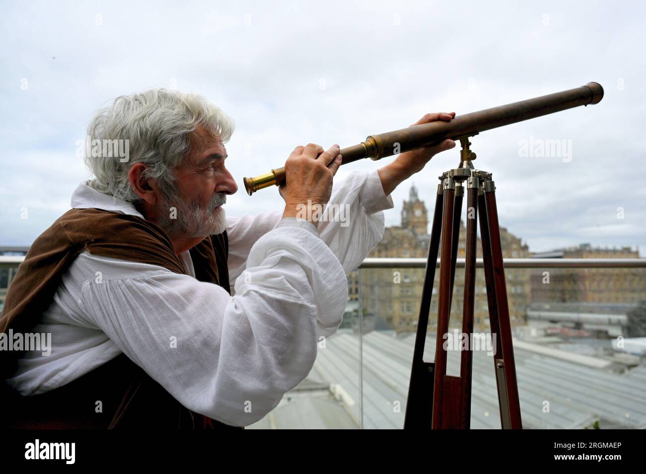 Galileo with his telescope sales