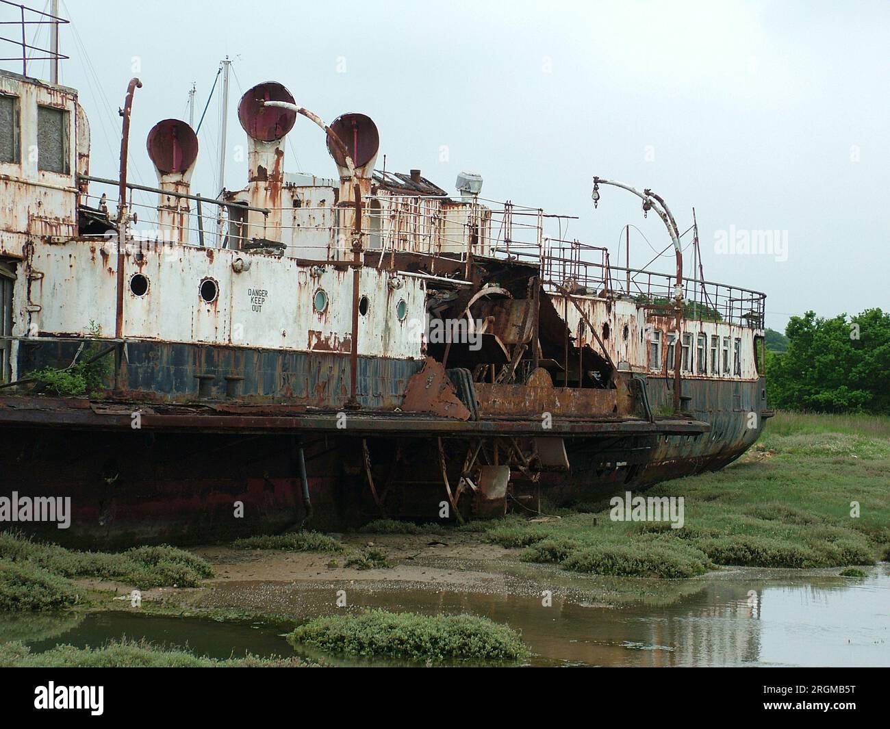 The paddle steamer Ryde derelict and rusting on tidal flats on the Isle