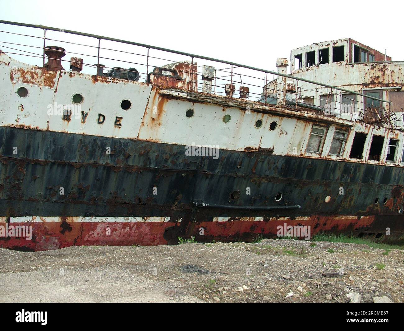 The paddle steamer Ryde derelict and rusting on tidal flats on the Isle