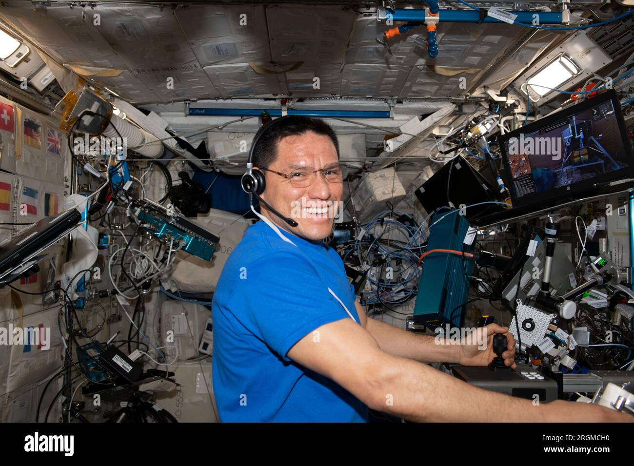 International Space Station, Earth Orbit. 24th July, 2023. International Space Station, Earth Orbit. 24 July, 2023. NASA astronaut and Expedition 68 Flight Engineer Frank Rubio completes a Surface Avatar session in the Columbus Laboratory Module aboard the International Space Station, July 24, 2023 in Earth Orbit. Surface Avatar investigates how haptic controls, user interfaces and virtual reality could command and control surface-bound robots from long distances. Credit: NASA/NASA/Alamy Live News Stock Photo