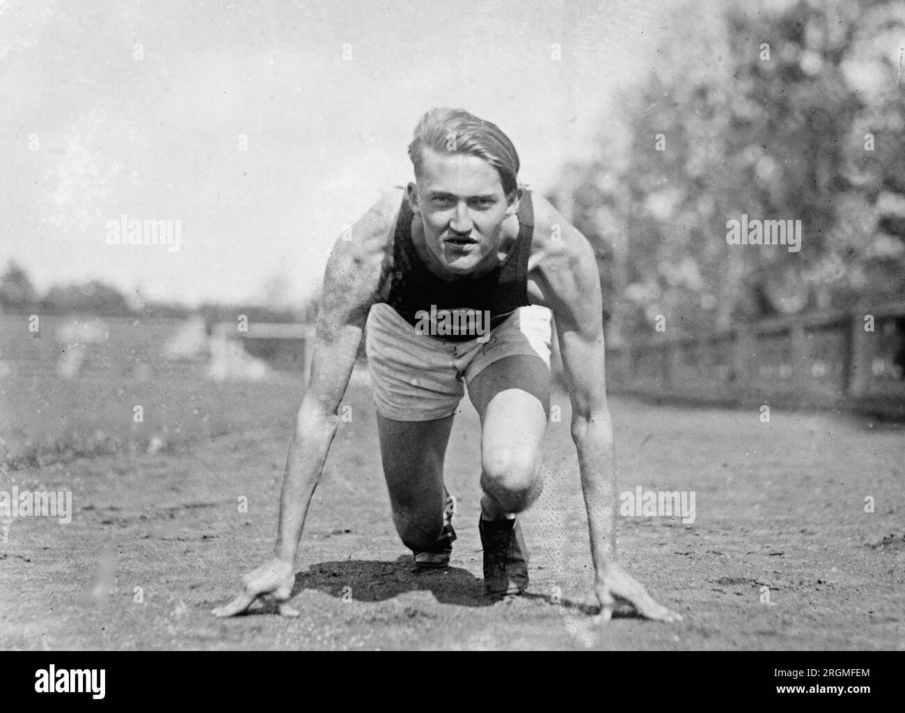 Track and field athlete in a starting pose ca. 1921 Stock Photo Alamy