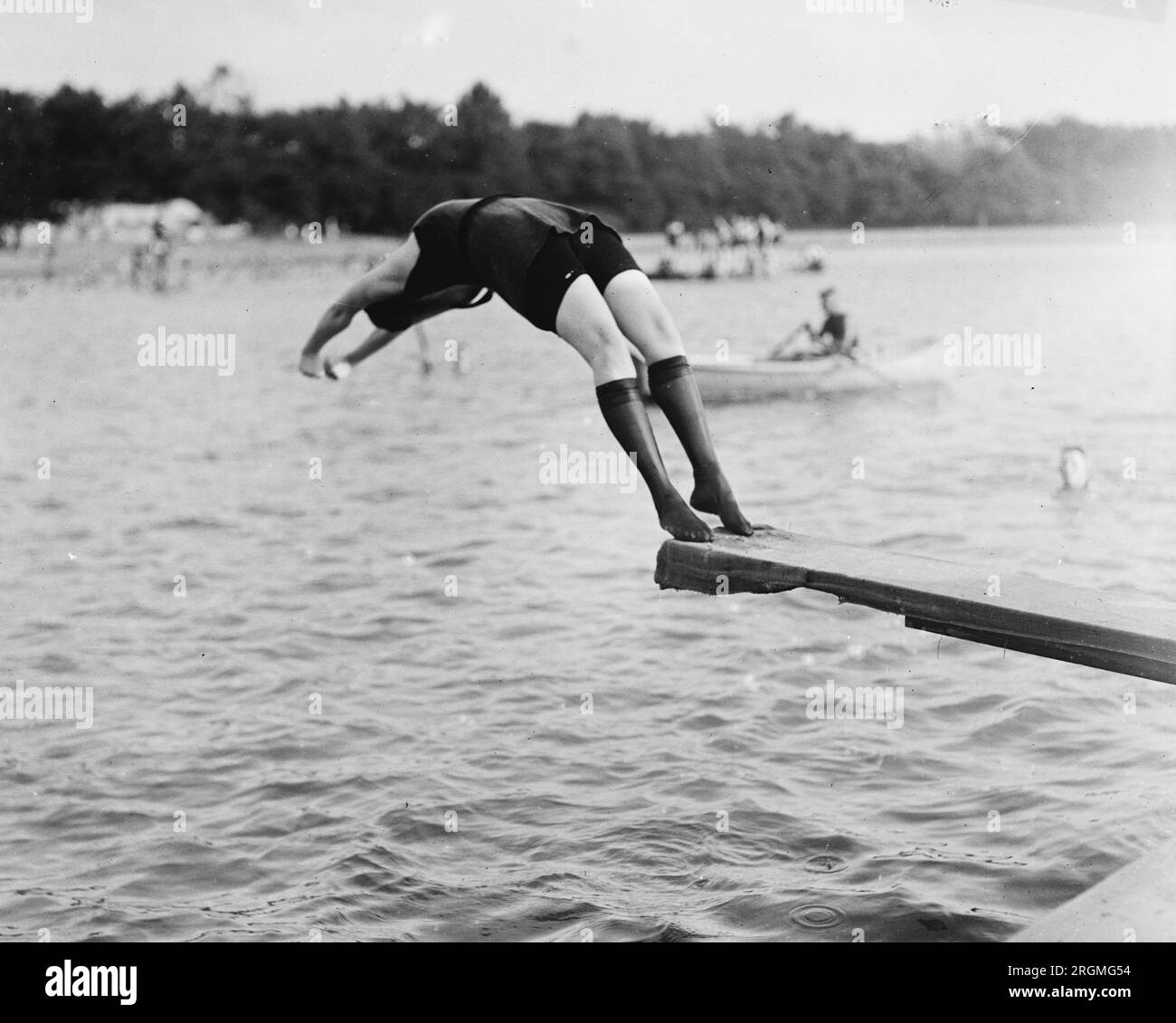 A woman diving into a lake ca. 1921 Stock Photo - Alamy