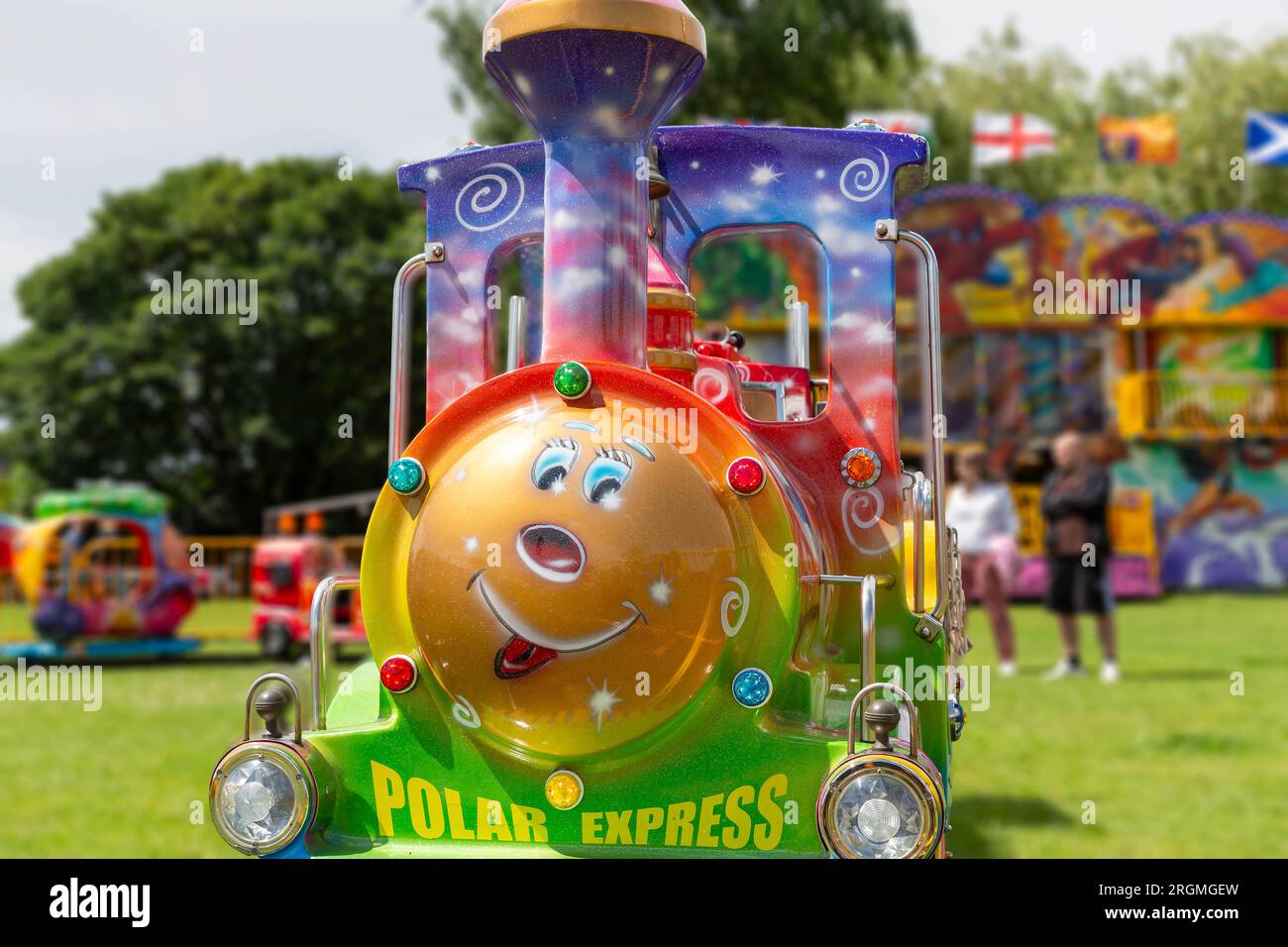Children's fairground train ride at the 2023 Winwick Carnival in Cheshire Stock Photo