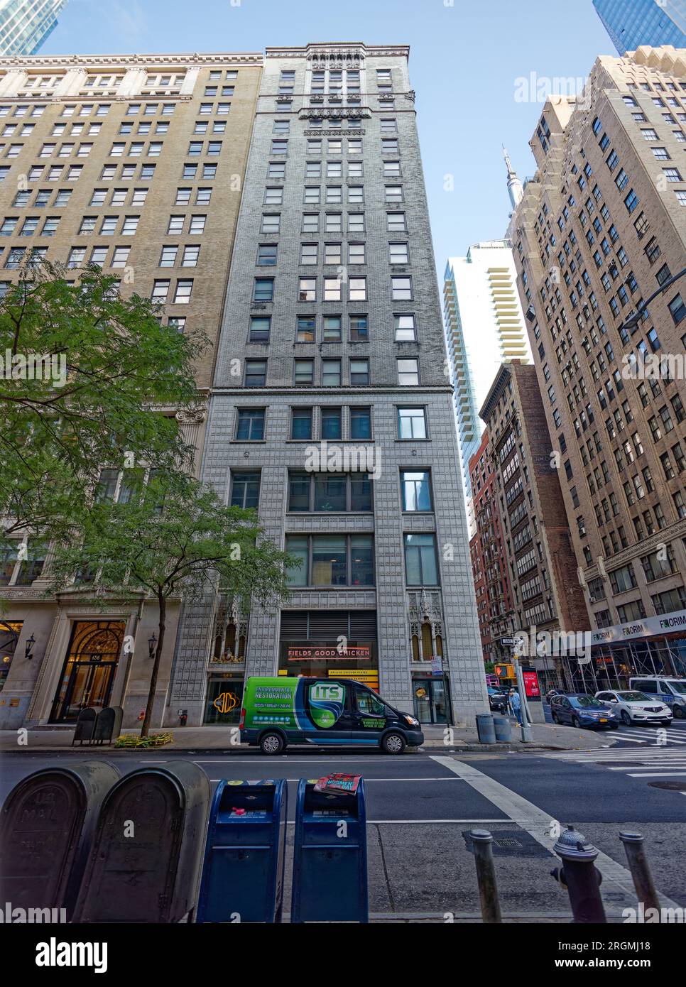 Midtown South: White terra cotta sheathes the base of Gothic-styled Remsen Building, a brick and terra cotta clad office tower at 148 Madison Avenue. Stock Photo