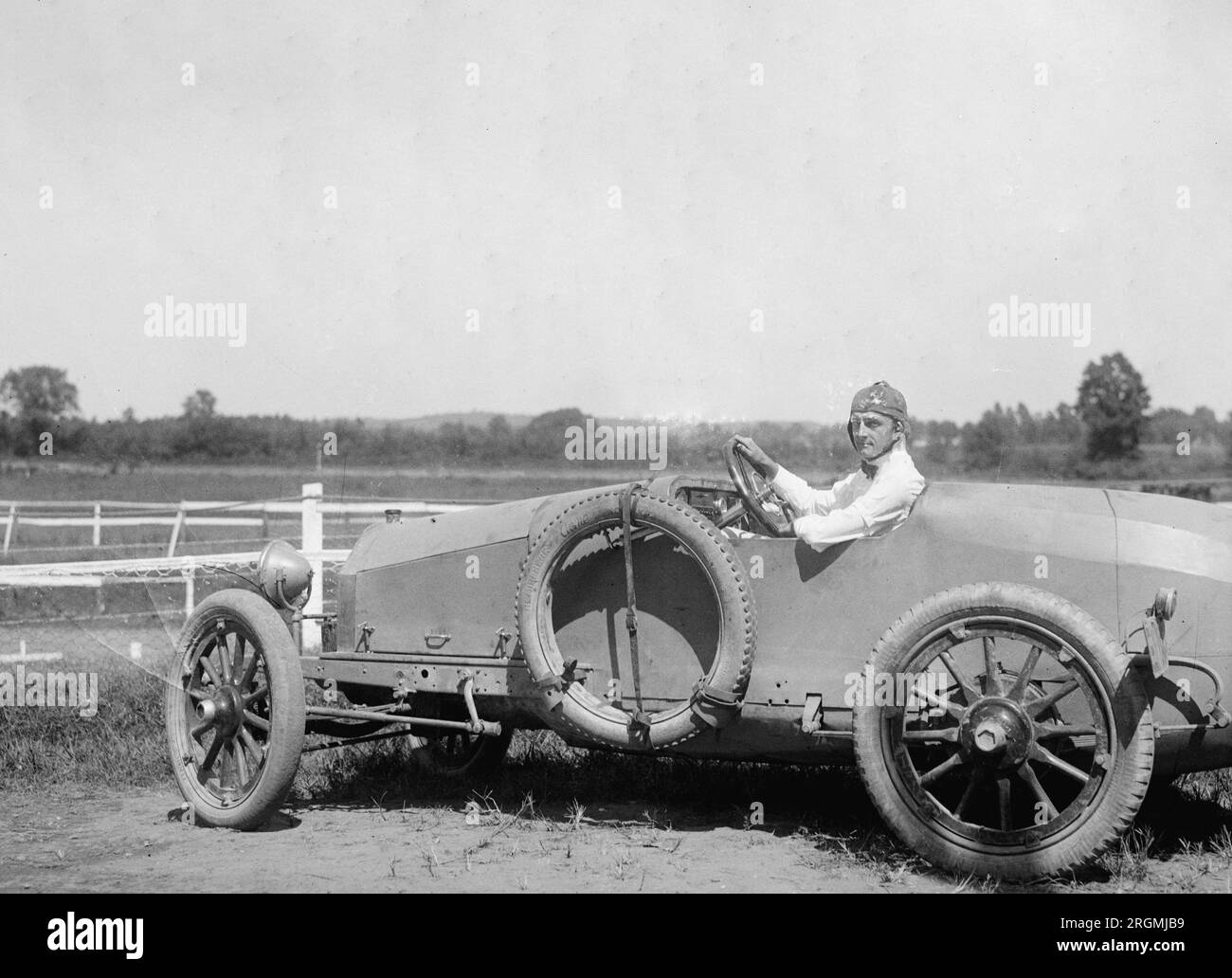 Vintage race car driver in a race car ca. 1915 Stock Photo Alamy