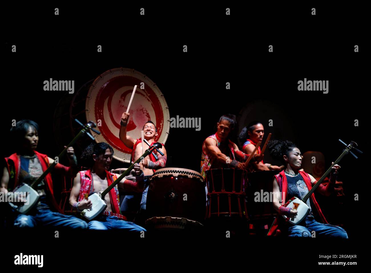 Madrid, Spain. 09th Aug, 2023. Artists from the group of musicians 'YAMATO Drummers', are seen on stage during the presentation of their show 'Tenmei' (Destiny in Japanese), at the 39th edition of Veranos de la Villa, at the Conde Duque Cultural Center, in Madrid. 'Yamato Drummers' is a group made up of dozens of musicians who have performed in more than 54 countries since it was created in 1993 in the Nara prefecture (Japan). (Photo by Hugo Ortuño/Pacific Press) Credit: Pacific Press Media Production Corp./Alamy Live News Stock Photo