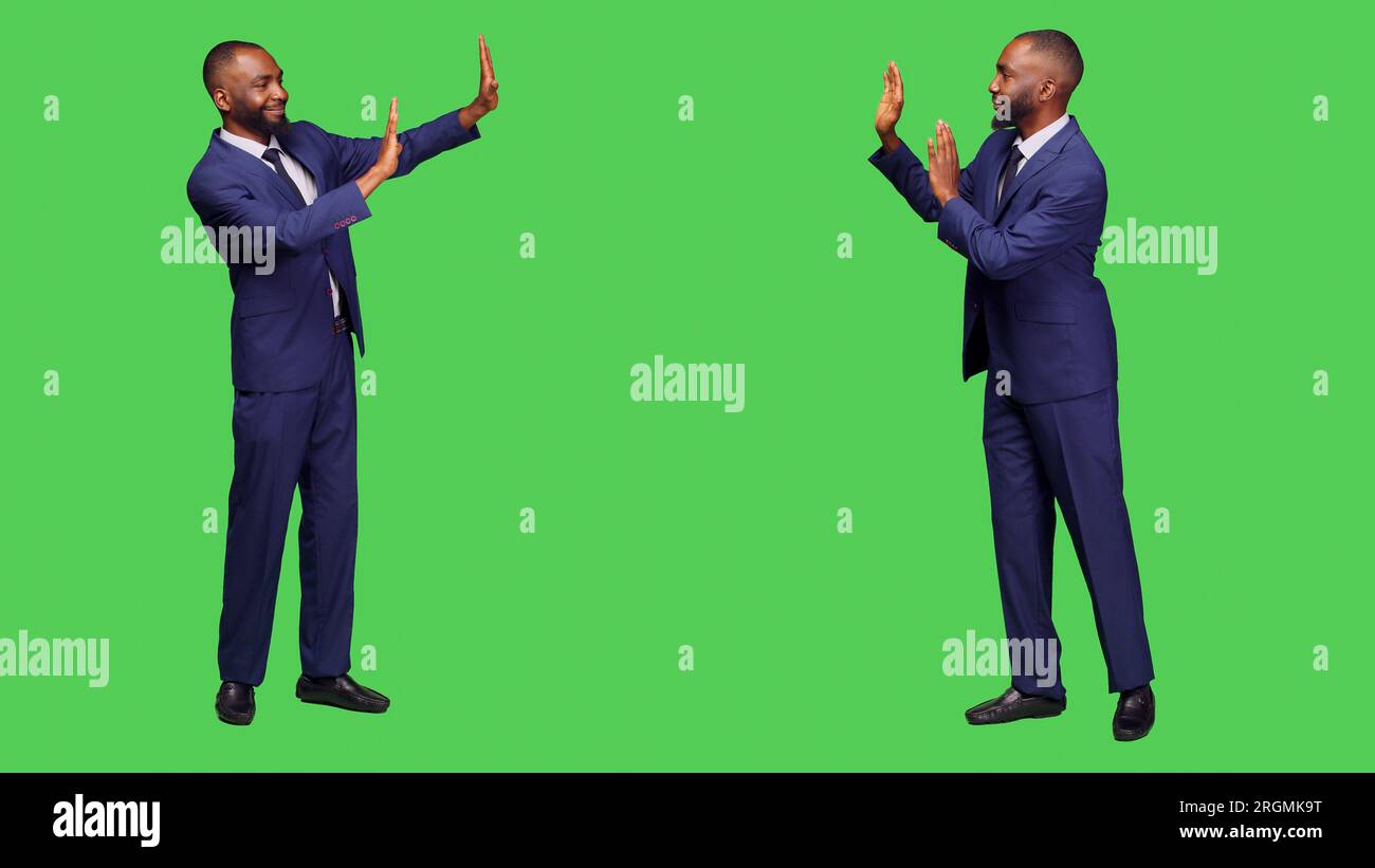 African american employee pushing something aside, showing rejection ...