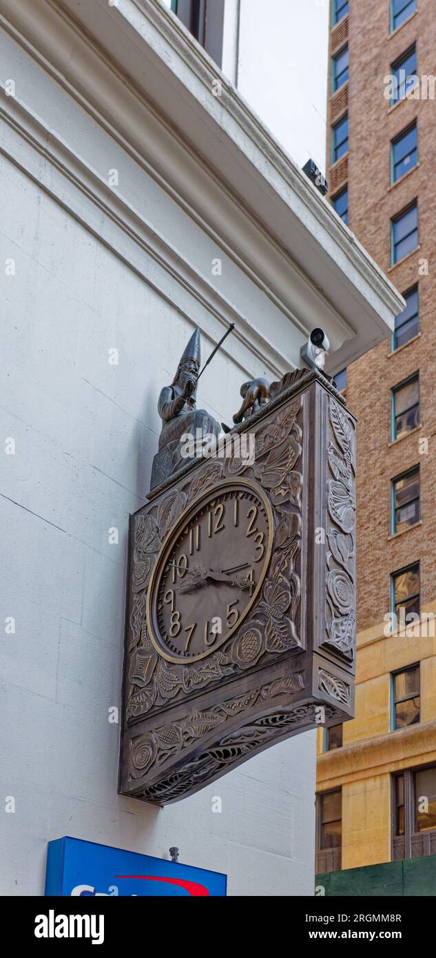 Midtown South: The Wizard of Park Avenue, perched atop The Silk Clock on the side of the Schwarzenbach Buildings, animates to strike the hour. Stock Photo