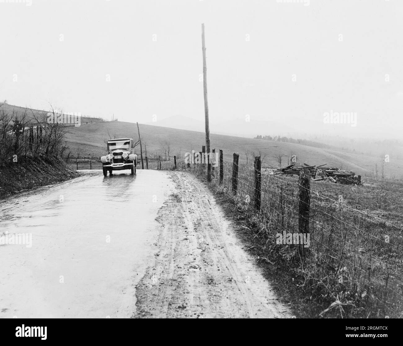 Automobile driving on a road in Shenandoah National Park, Virginia ca. 1925 Stock Photo