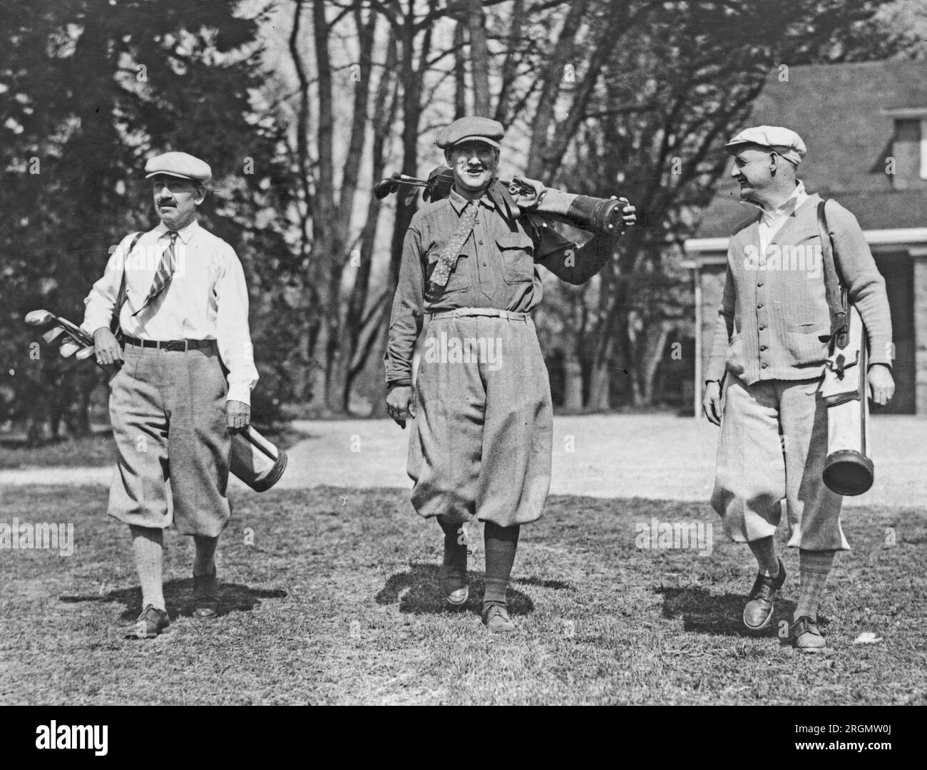 Congressmen snapped on the golf links at Chevy Chase Club today. Left to right: Rep. Herbert W. Taylor of N.J., Rep. Albert H. Vestal of Indiana, the Republican Whip of the House, and Rep. Wm. R. Coyle of Pa. ca. 1926 Stock Photo
