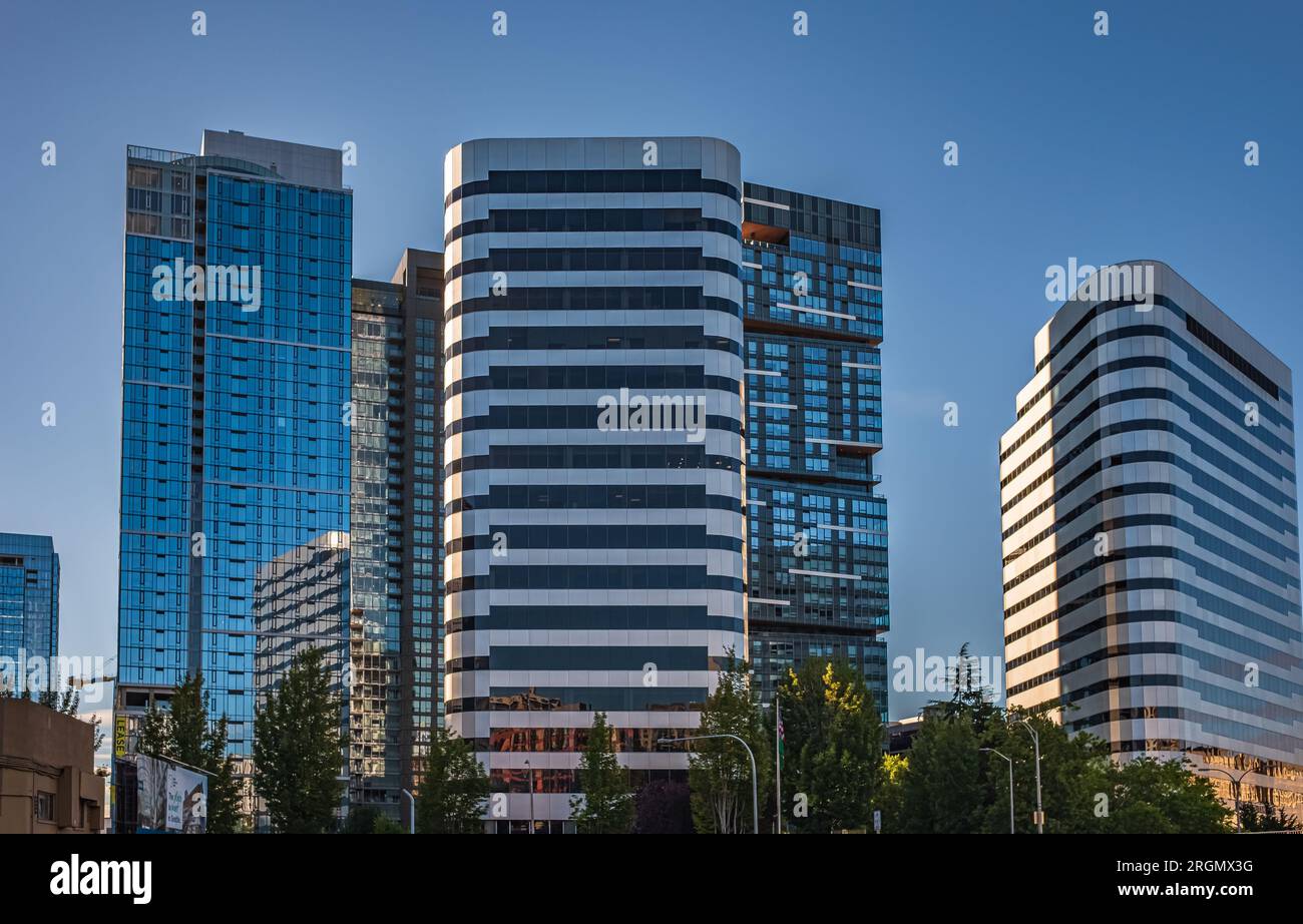 Seattle downtown skyline and skyscrapers beyond the I-5 I-90 freeway interchange at sunset. Modern City Skyscrapers, Seattle city architecture. Travel Stock Photo