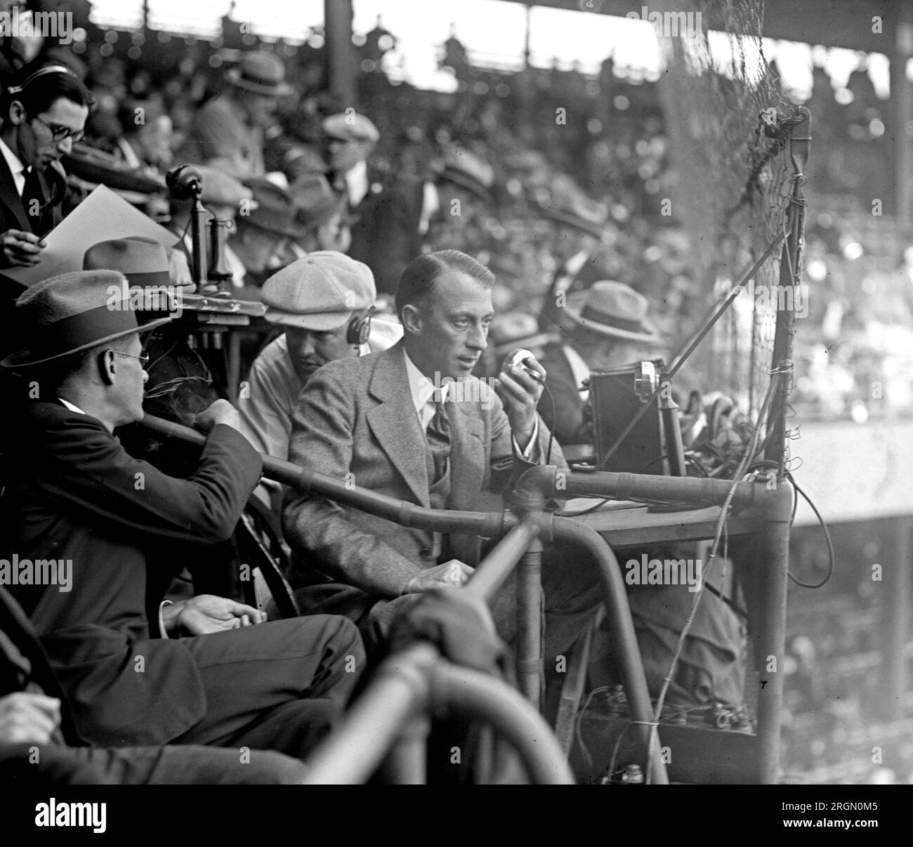 Radio announcer Graham McNamee of W.E.A.E broadcasting World Series, 10