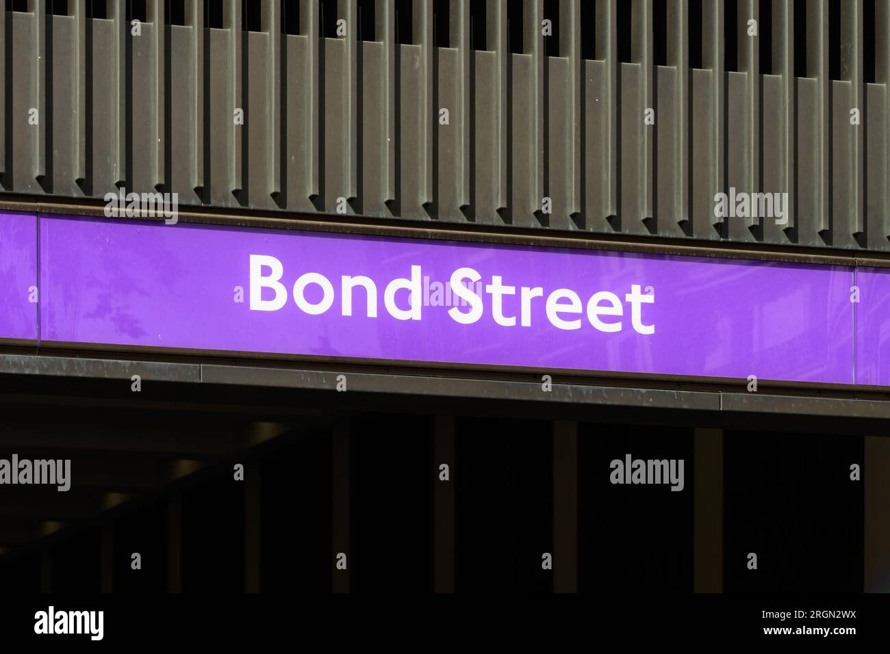 London, UK - July 30, 2023; Elizabeth Line location sign in puple at Bond Street station in central London Stock Photo