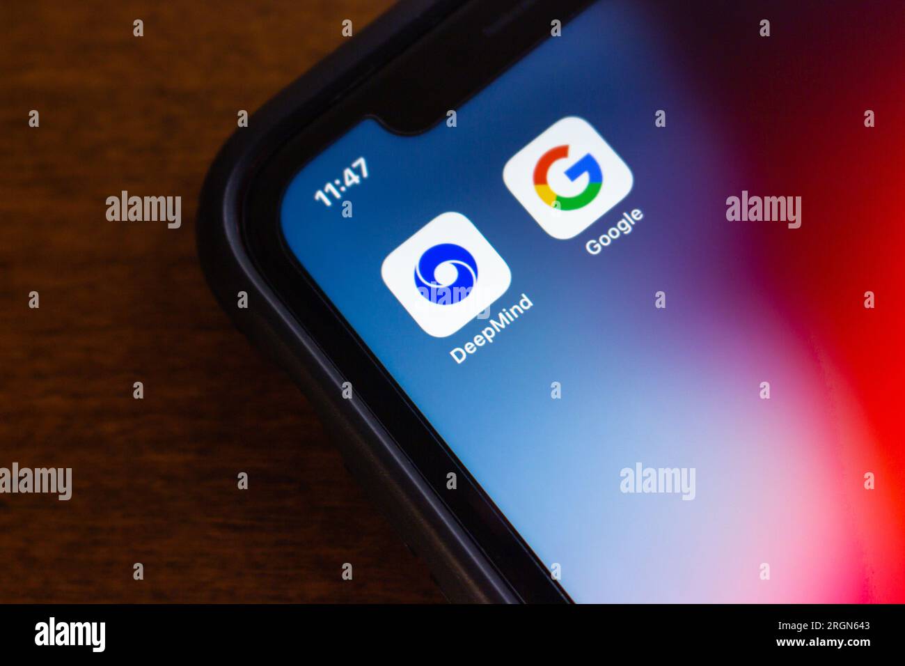 Icon of Google DeepMind, is a UK artificial intelligence research laboratory (a subsidiary of Google), with Google icon seen on an iPhone. Stock Photo