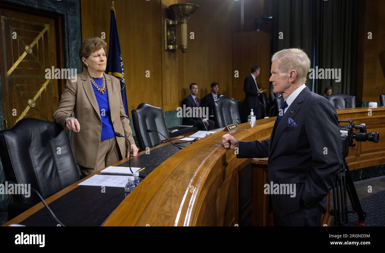 Reportage: NASA before the Senate Appropriations’ Commerce, Justice, Science, and Related Agencies subcommittee (May 2022) - Senator Jeanne Shaheen, D-N.H., talks with NASA Administrator Bill Nelson prior to a hearing, Tuesday, May 3, 2022, at the Dirksen Senate Office Building Stock Photo