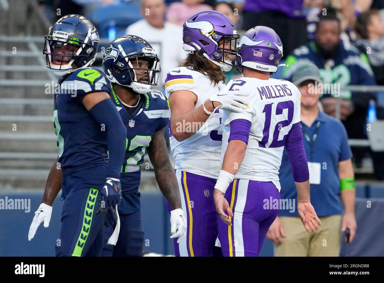 Minnesota Vikings quarterback Nick Mullens (12) celebrates after throwing a  touchdown pass to tight end Nick Muse, second from right, during the first  half of an NFL preseason football game against the