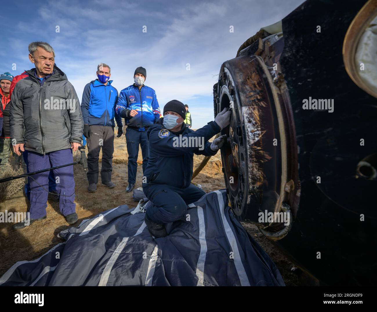 Reportage: Expedition 66 Soyuz Landing (March 2022) - Russian Search and Rescue teams arrive at the Soyuz MS-19 spacecraft shortly after it landed in a remote area near the town of Zhezkazgan, Kazakhstan, March 30, 2022. Stock Photo