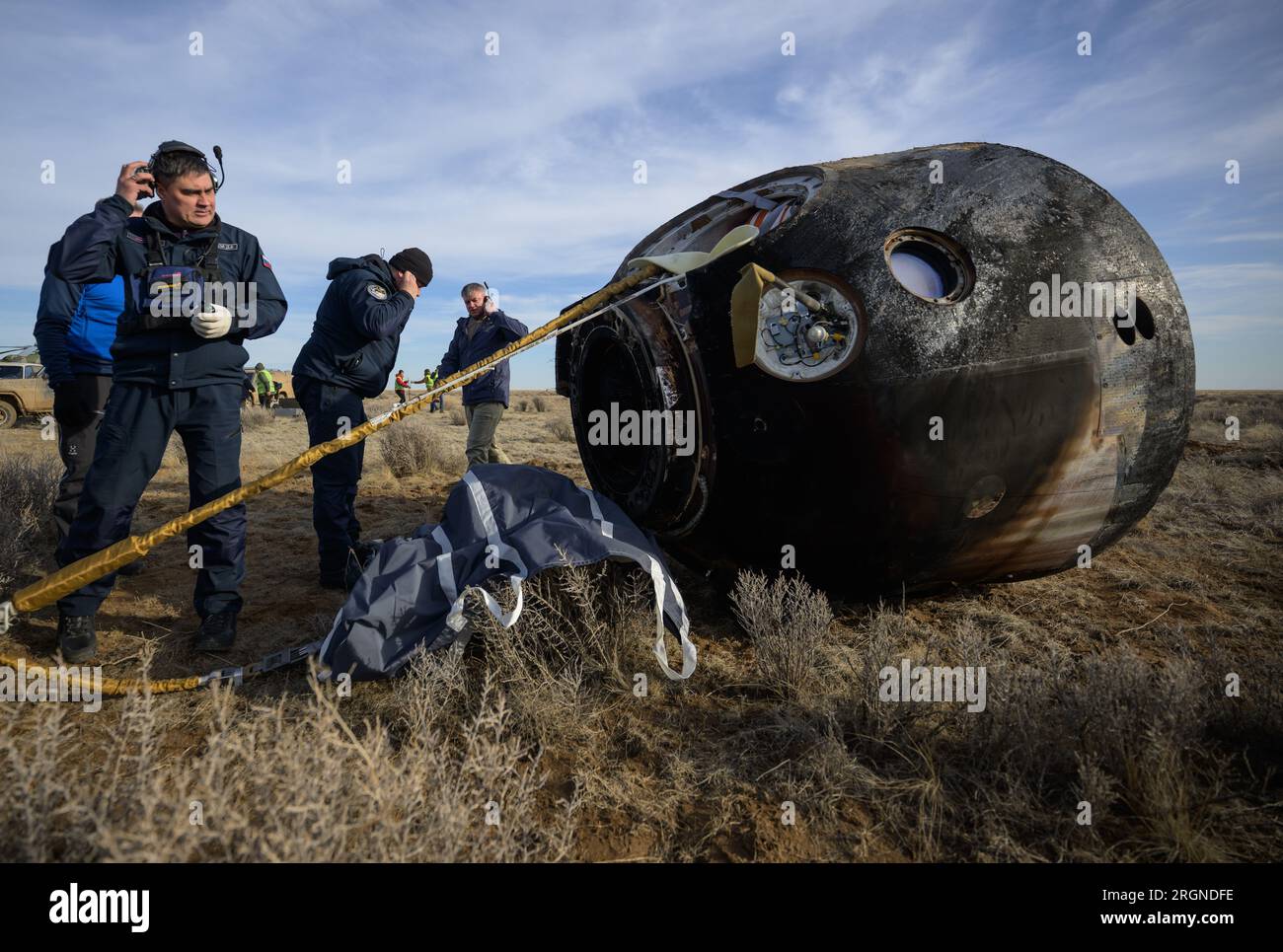 Reportage: Expedition 66 Soyuz Landing (March 2022) - Russian Search and Rescue teams arrive at the Soyuz MS-19 spacecraft shortly after it landed in a remote area near the town of Zhezkazgan, Kazakhstan, Wednesday, March 30, 2022. Stock Photo