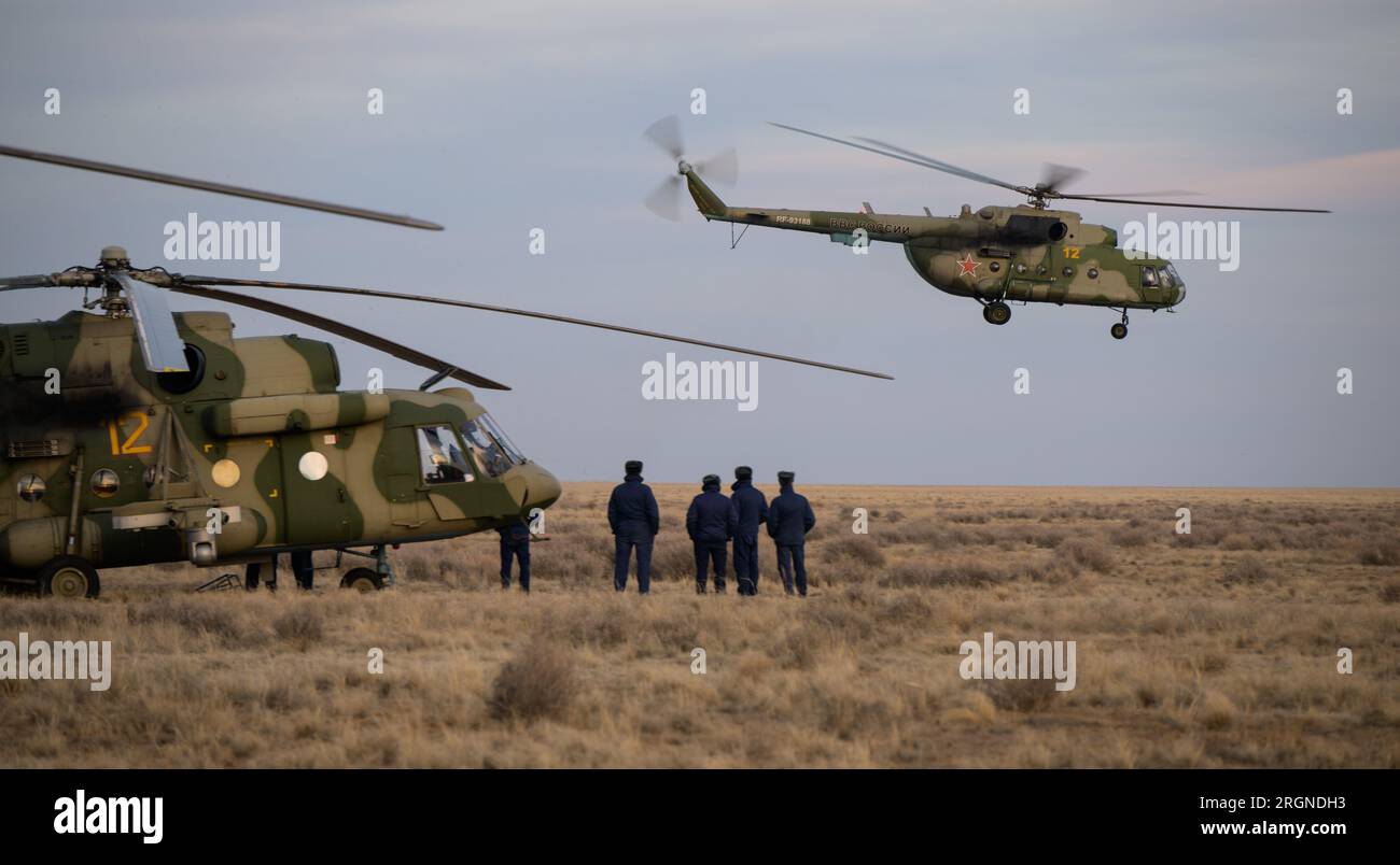 Reportage: Expedition 66 Soyuz Landing (March 2022) - Russian support personnel start to depart the Soyuz MS-19 spacecraft landing site shortly after it landed in a remote area near the town of Zhezkazgan, Kazakhstan, Wednesday, March 30, 2022. Stock Photo