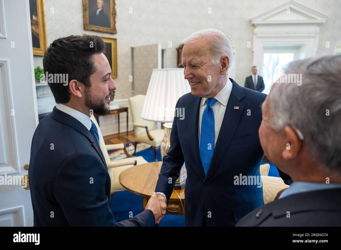 Reportage: President Joe Biden greets King Abdullah II and Crown Prince Hussein of Jordan before their lunch, Thursday, February 2, 2023, in the Oval Office of the White House. Stock Photo