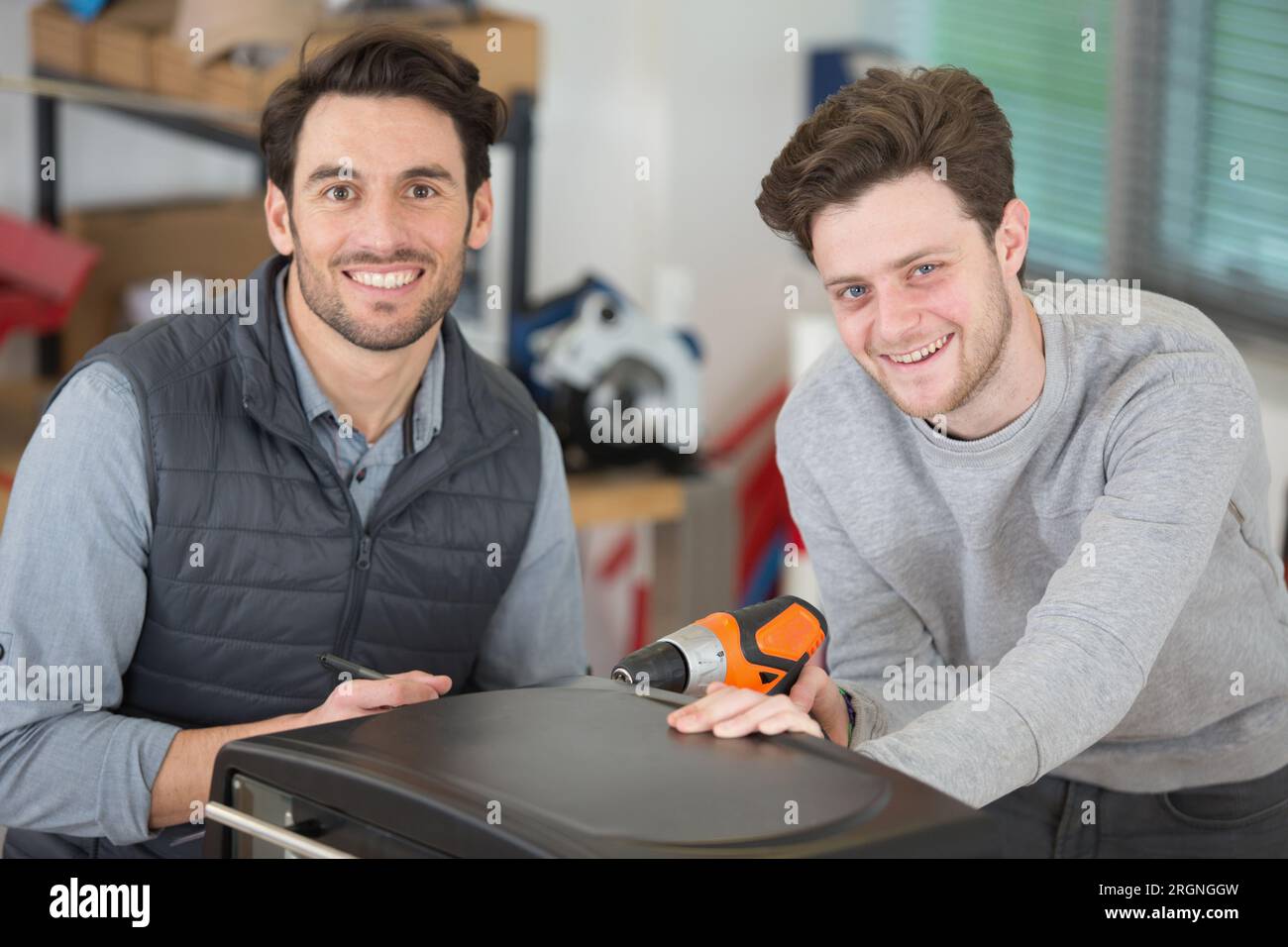 trainer and apprentice in vocational training Stock Photo