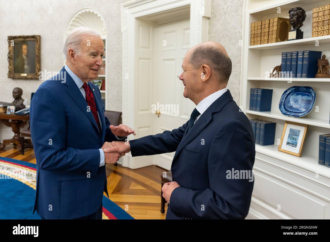 Reportage: President Joe Biden greets German Chancellor Olaf Scholz, Friday, March 3, 2023, in the Oval Office of the White House. Stock Photo