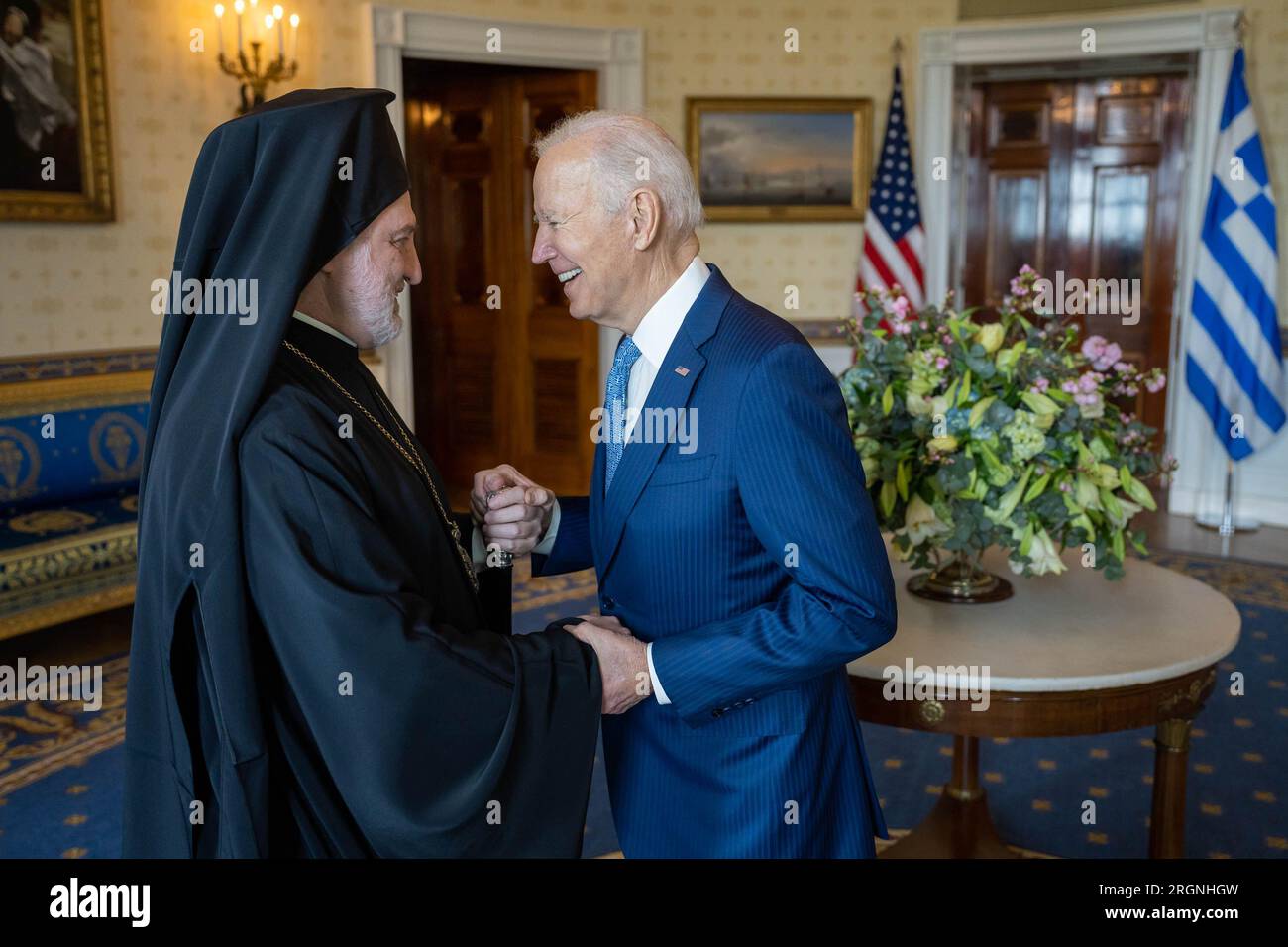 Reportage: President Joe Biden and Archbishop Elpidophoros talk before a Greek Independence Day reception, Wednesday, March 29, 2023, in the Blue Room of the White House. Stock Photo