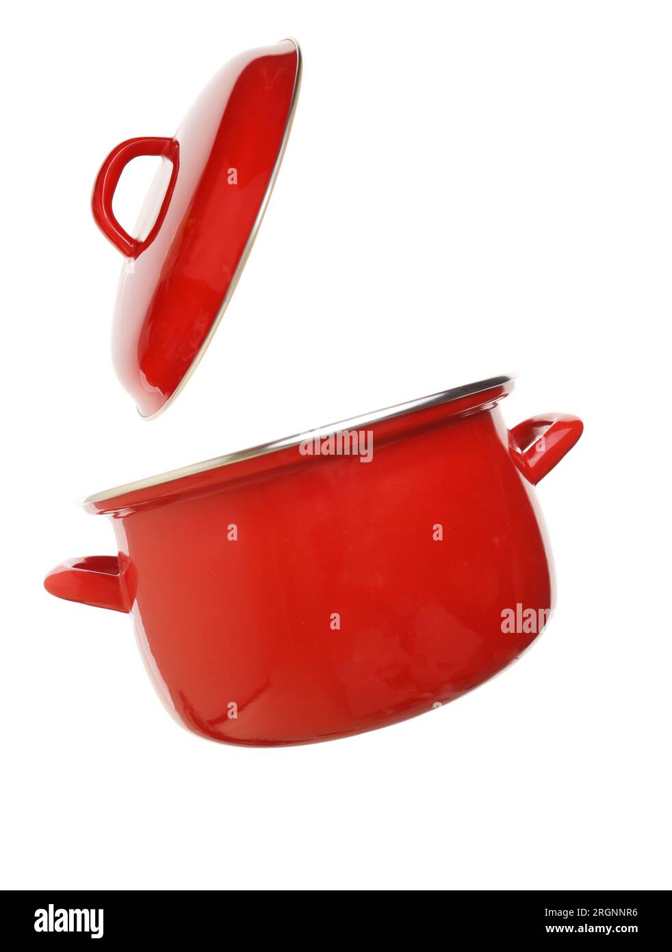 Red cooking pot flying isolated on white transparent background Stock Photo