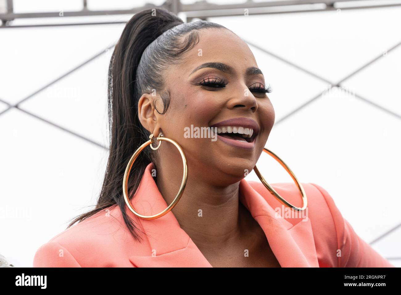 Ashanti visits Empire State Building in New York on August 10, 2023 for lighting ceremony in