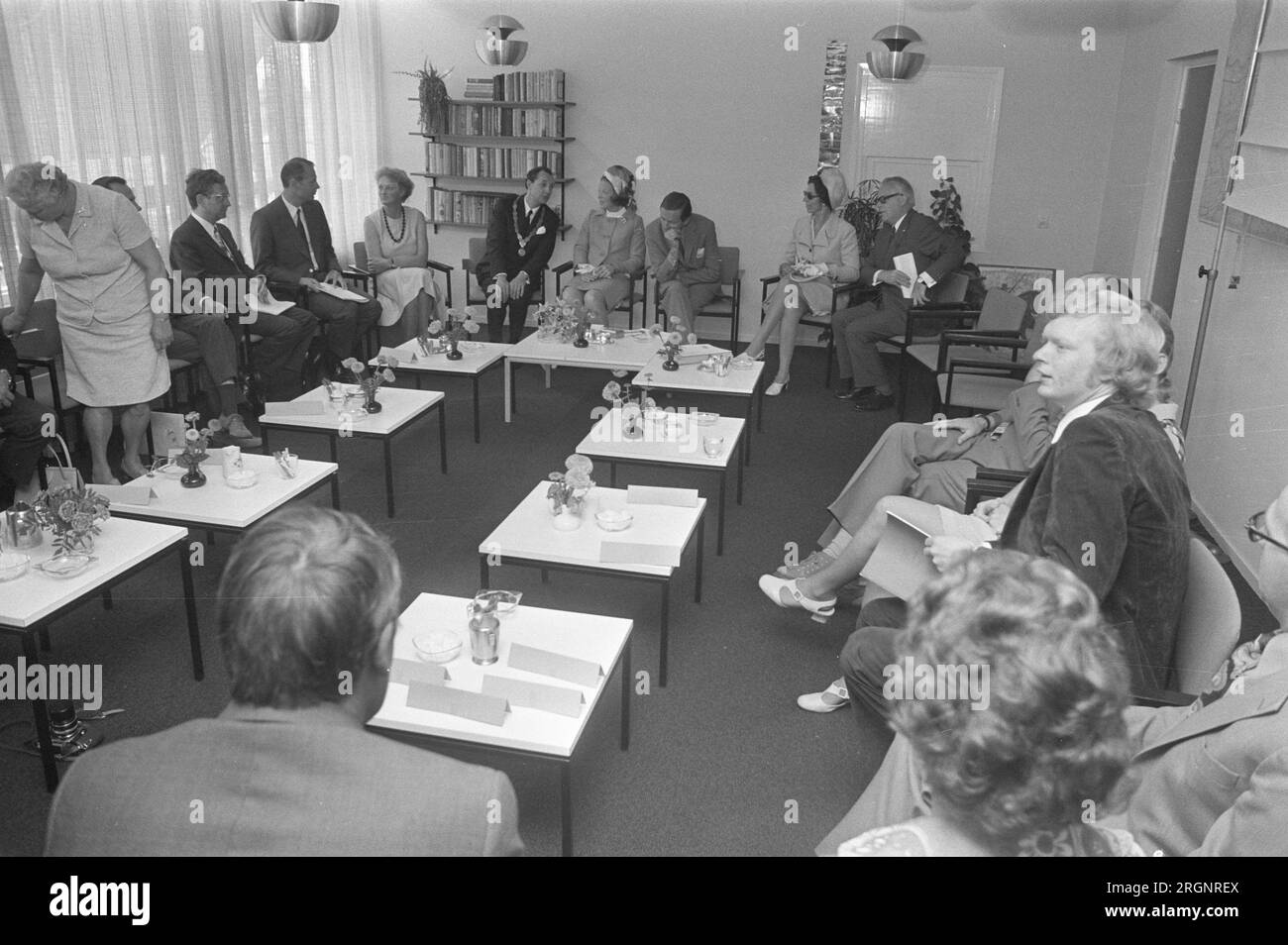 Working visit of Princess Beatrix and Prince Claus to the province of Utrecht, Beatrix and Claus visit a retirement home in Lopik, Claus speaks with the elderly; ca. August 1972 Stock Photo