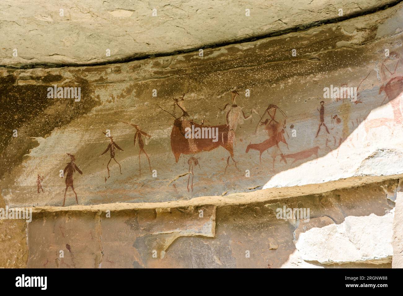 Rock art images in the Injisuthi Battle Cave in the Giants Castle area in the Drakensberg mountains in South Africa Stock Photo