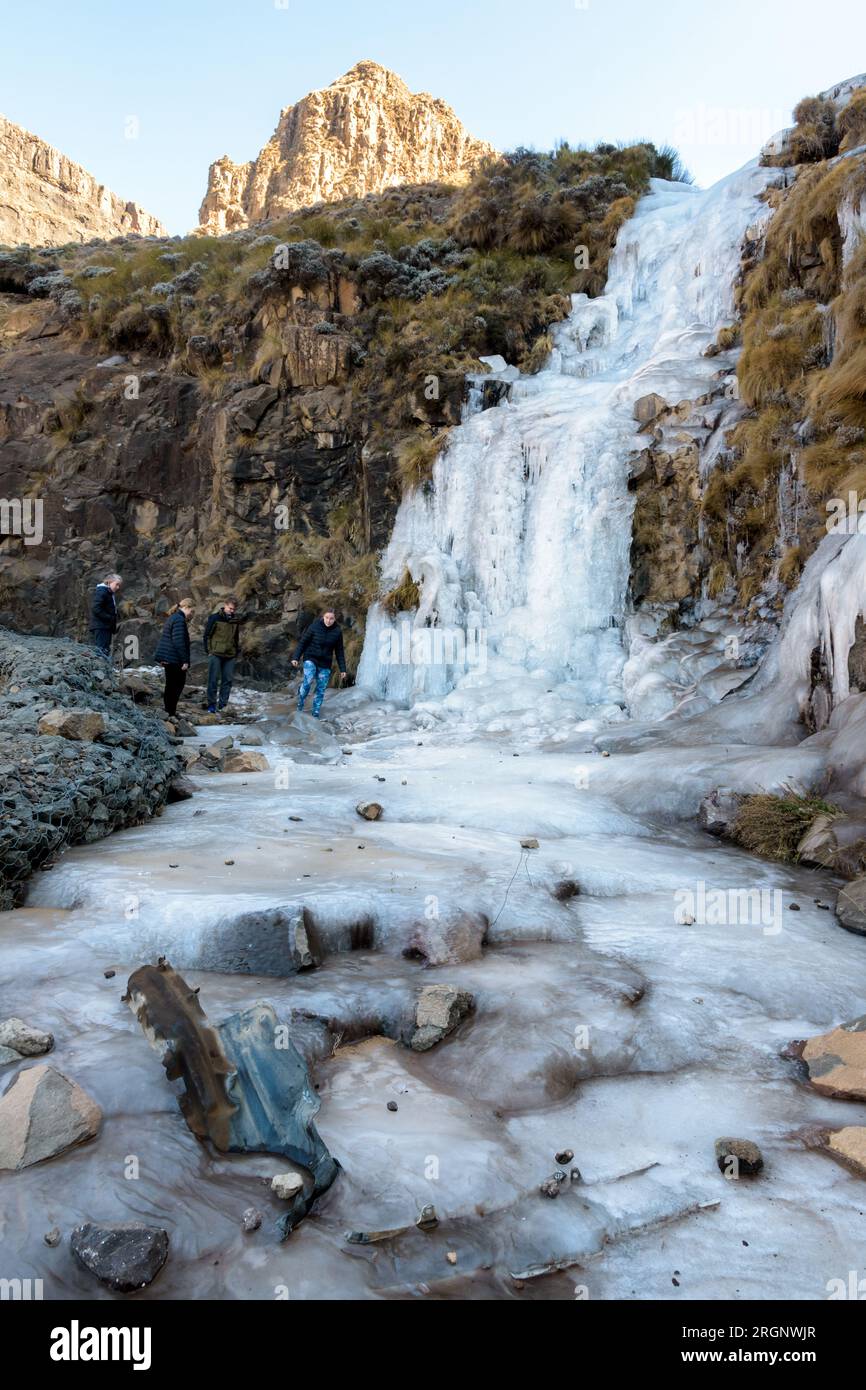 Iced waterfall along the famous Sani pass between South Africa and Lesotho Stock Photo