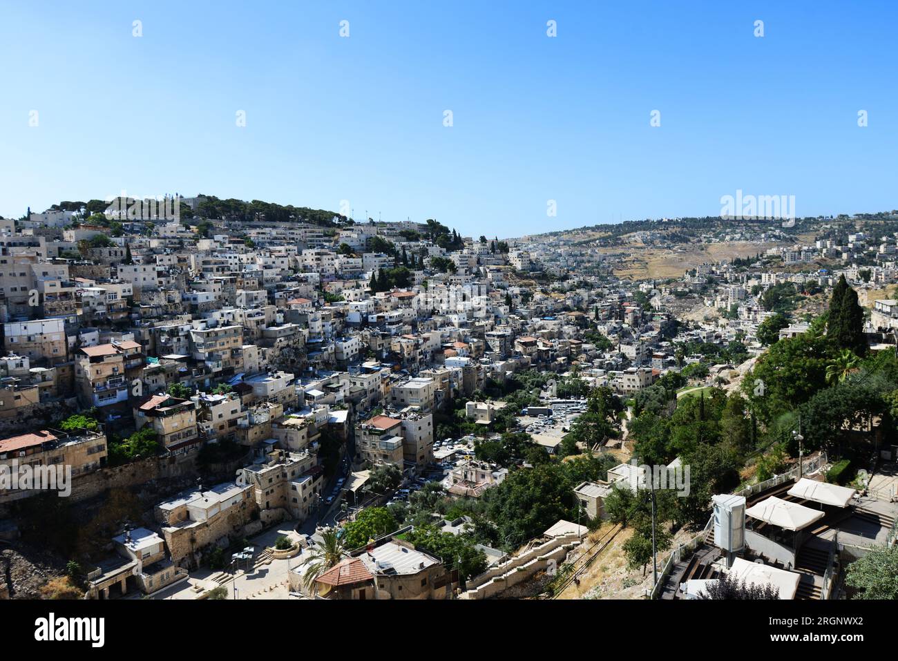 A view of the Palestinian neighborhood of Ras al-Amud in East Jerusalem from the City of David archeological site. Stock Photo