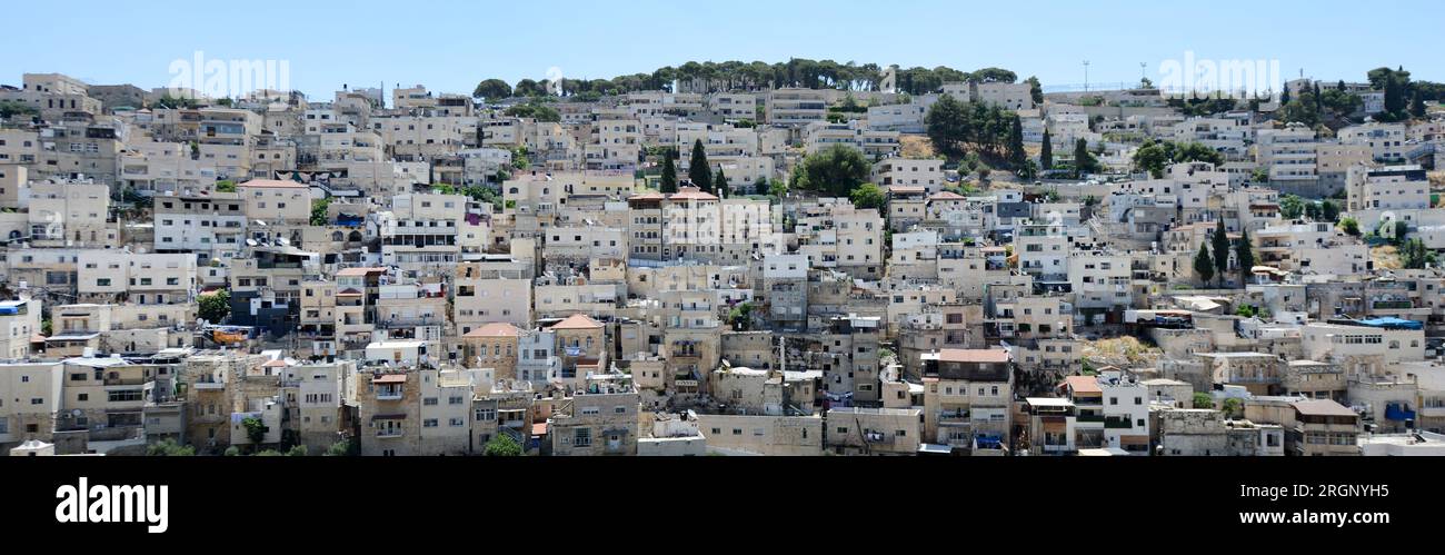 A view of the Palestinian neighborhood of Ras al-Amud in East Jerusalem from the City of David archeological site. Stock Photo