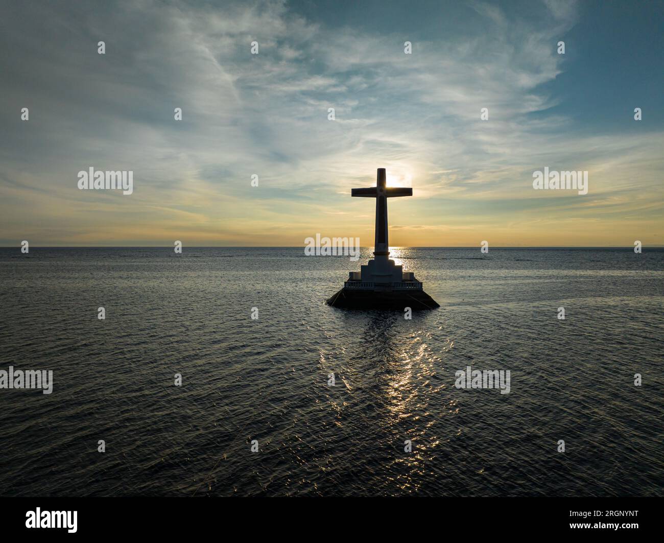Sunken Cemetery with sun on the background in Camiguin Island. Historical landmark in the Philippines. Stock Photo