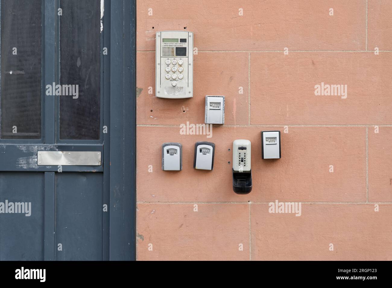 Push buzzer door bells for entry to building Stock Photo Alamy